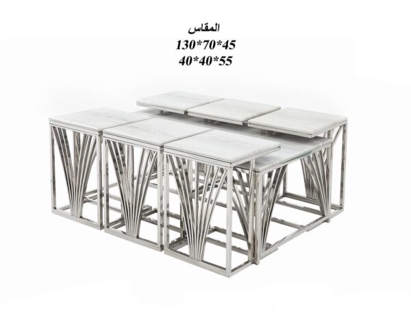 520d10d2-3e60-4e73-999b-d4dbcd995015 طقم طاولات سطح رخام إستيل فضي ٧ قطع