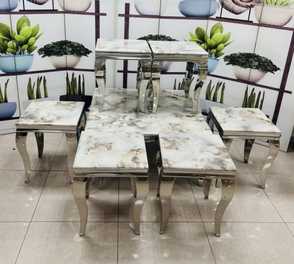 9394ad77-7691-4dbc-8db7-036eda5b43c8 طقم طاولات رخام إستيل فضي ٧ قطع