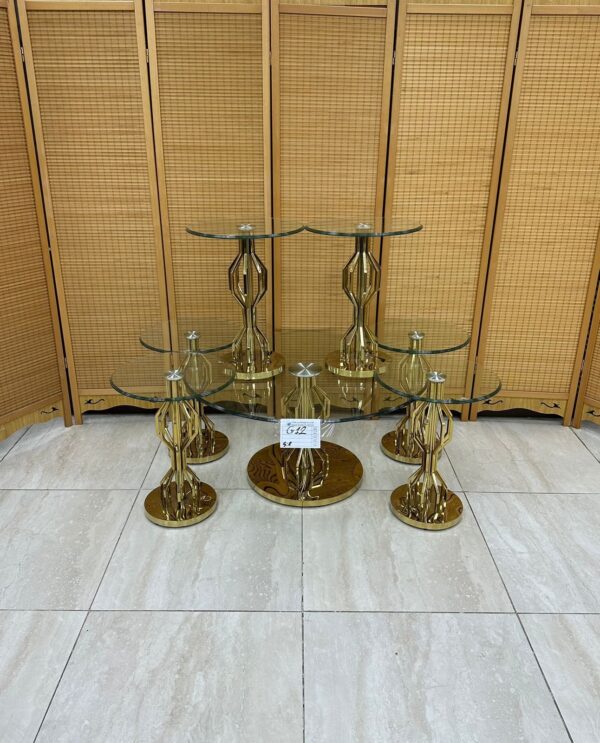 طقم طاولات سطح زجاج قاعدة استيل ذهبي ٧ قطع طقم طاولات سطح زجاج قاعدة استيل ذهبي ٧ قطع